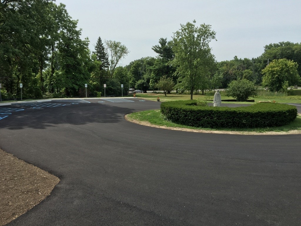 Freshly sealcoated and restriped commercial parking lot